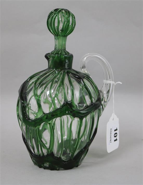 A Stevens & Williams clear and green cagework glass jug and stopper, registered design number for 1884, height 21.5cm